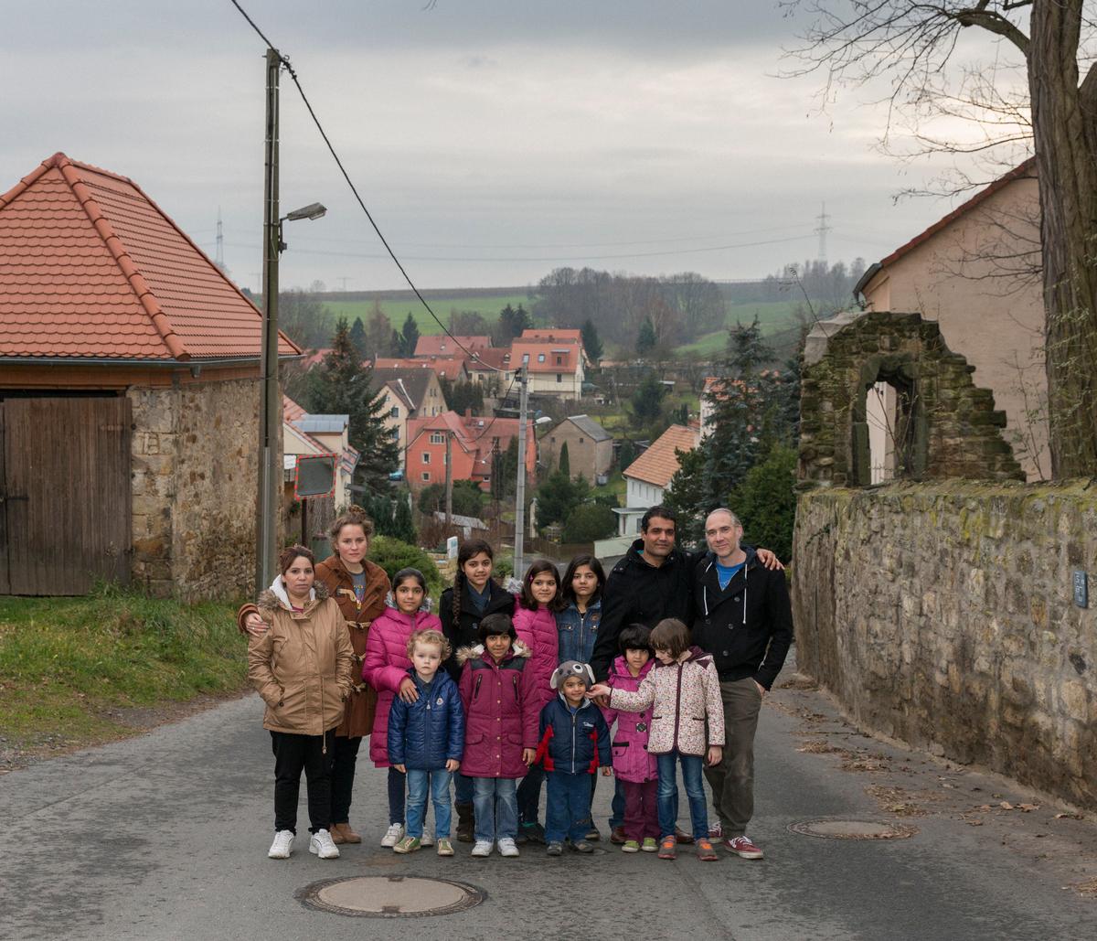 German couple Sarah, Stevi and their children Fjodor Isai, 3, and Pekka-Lu, 6, welcomed a family of Afghan asylum-seekers into their village of Röhrsdorf near Dresden. Mecid, 37, and his wife Rehime, 34, have six daughters, Nazle, 12, Zahra, 11, Sahra, 9, Perisa, 10, Mubina, 5, Behare, 4, and a son, Mensur, 2. Their eighth child is on the way.